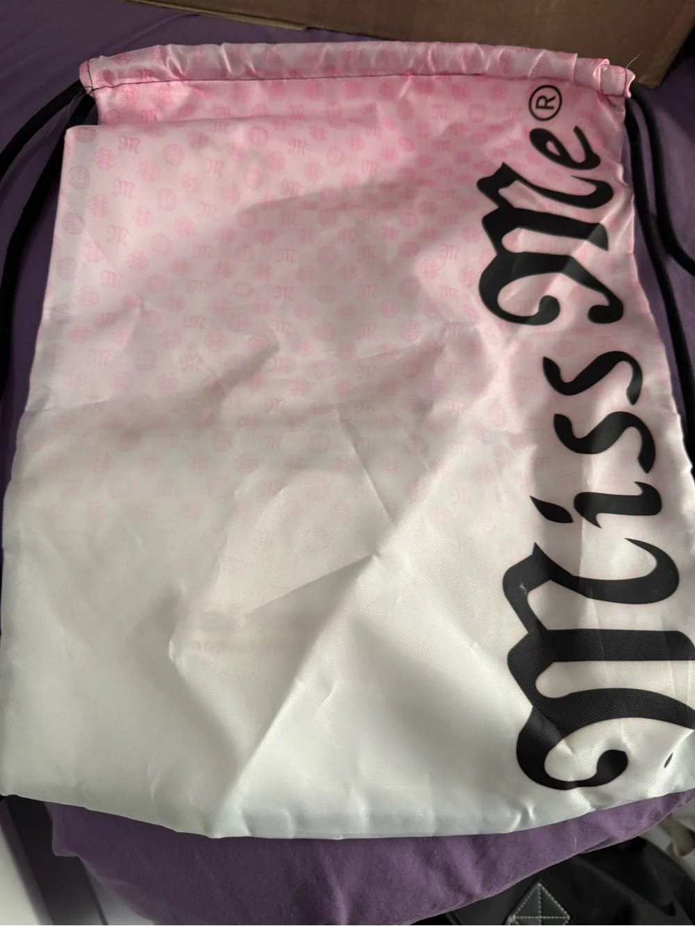 Miss Me Pink and White Drawstring Backpack with Bold Logo